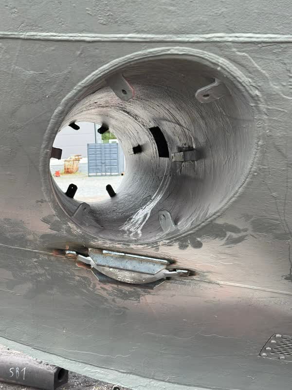 Looking straight through the round bow thruster tunnel in the pilot boat’s hull